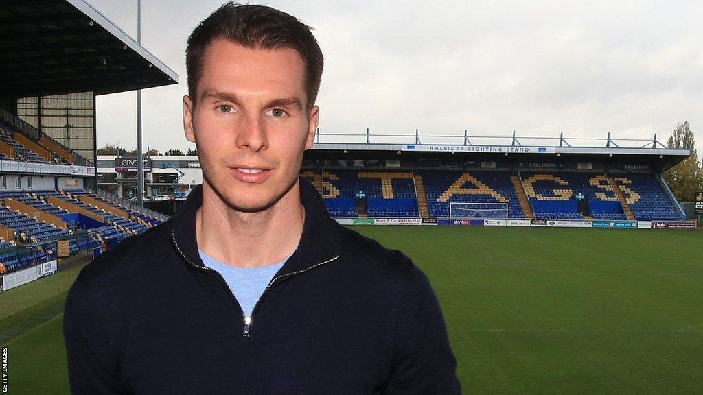 David Sharpe looks on at Mansfield