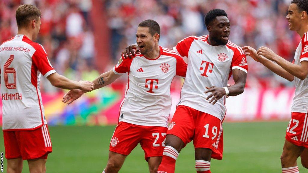 Raphael Guerreiro celebrates scoring for Bayern Munich