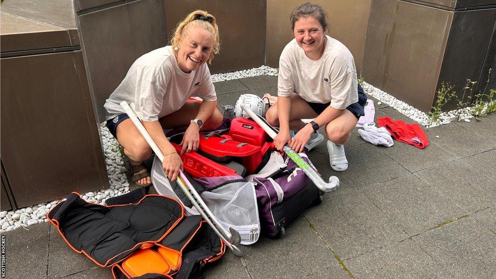 Scotland players with their hockey equipment