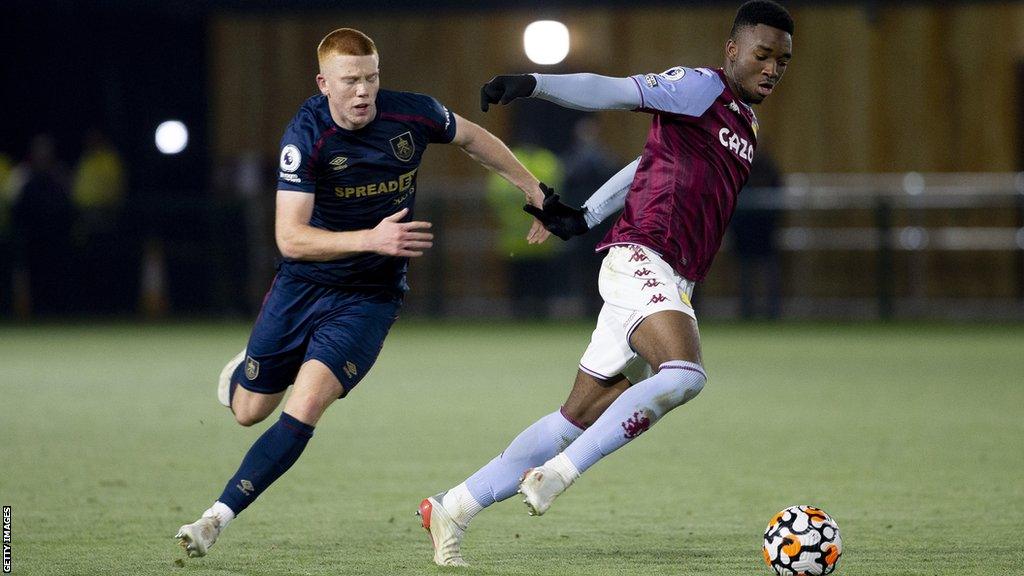 Bristol Rovers have signed defenders Lamare Bogarde from Aston Villa and Calum Macdonald from Stockport County.