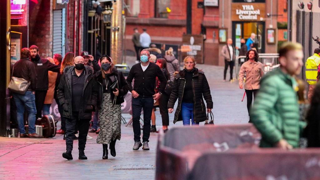 People in masks in Liverpool