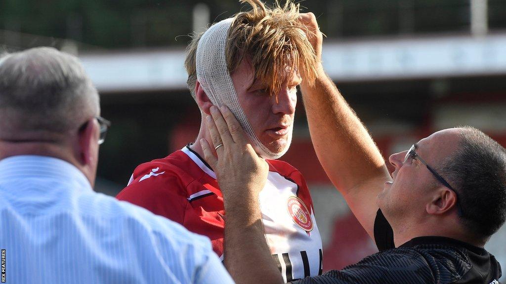 Stevenage defender Carl Piergianni finished the game with his head bandaged