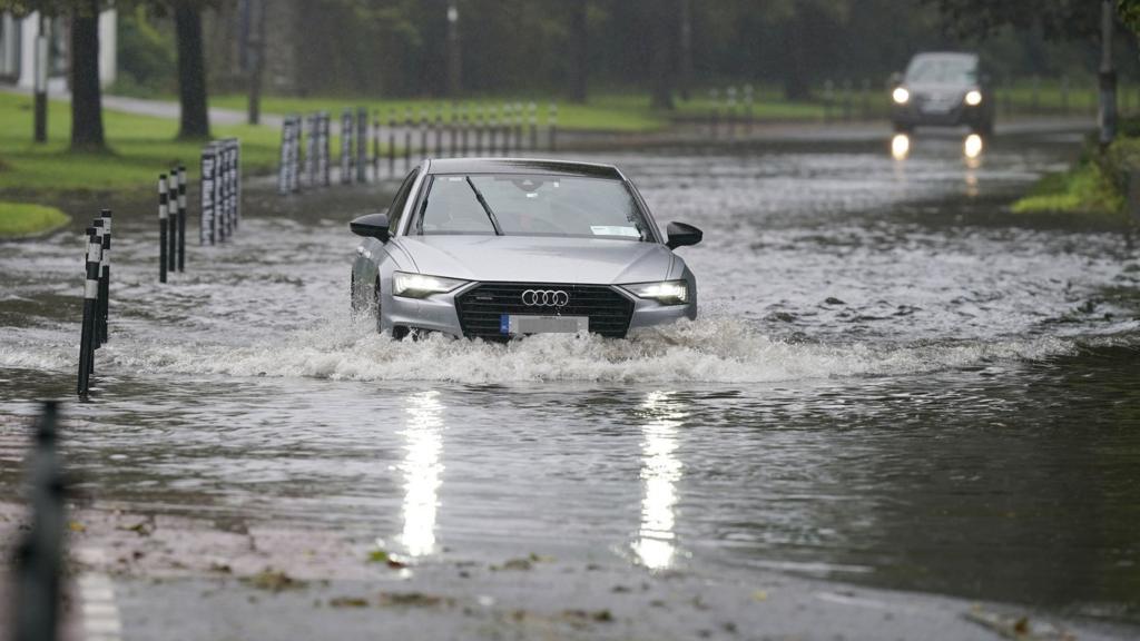 A car driving through floodwater in Cork. Wednesday, 27 September