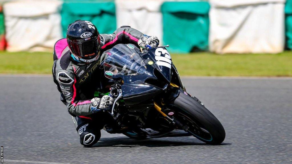 Newcomer Jack Petrie says the Isle of Man TT is the "Glastonbury of motor racing" as he prepares to make his debut at the hair raising event.