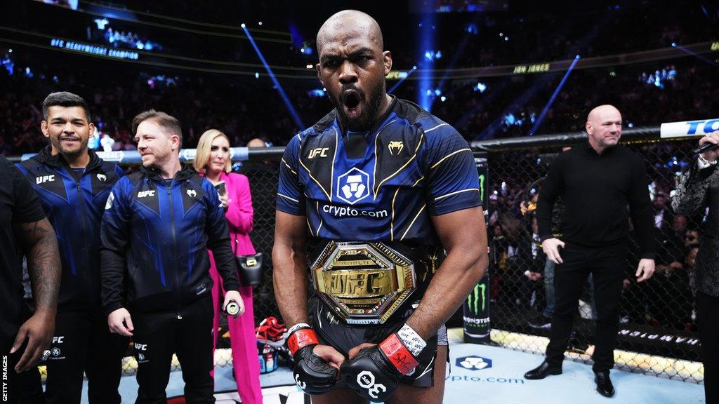 Jon Jones with his UFC belt around his waist