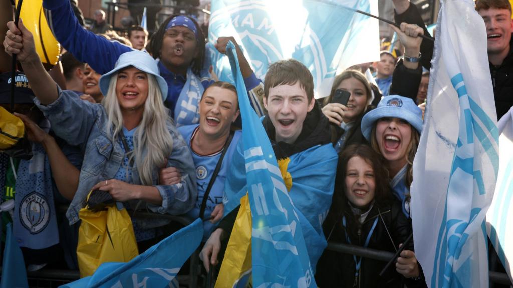 Manchester City fans celebrate