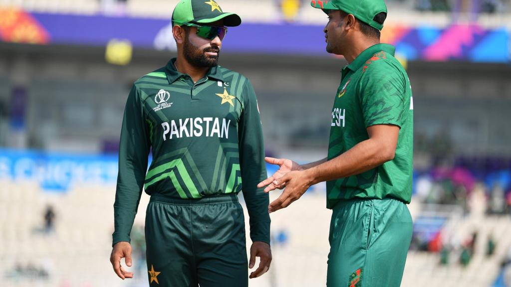 Pakistan captain Babar Azam talks to Bangladesh captain Shakib Al Hasan