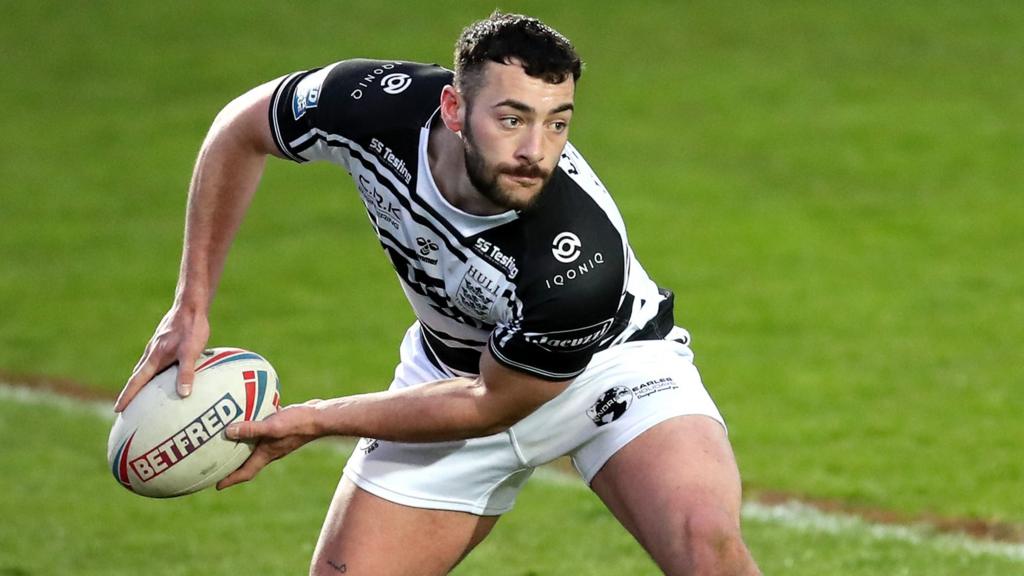 Jake Connor of Hull FC passes the ball