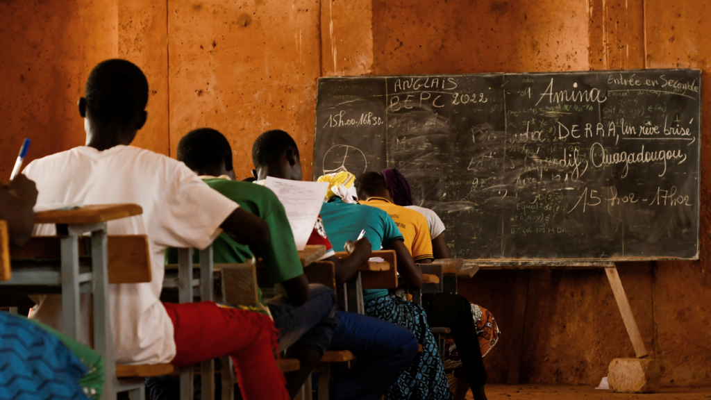 Students writing exams in a classroom in Gando, Burkina Faso - Friday 3 June 2022