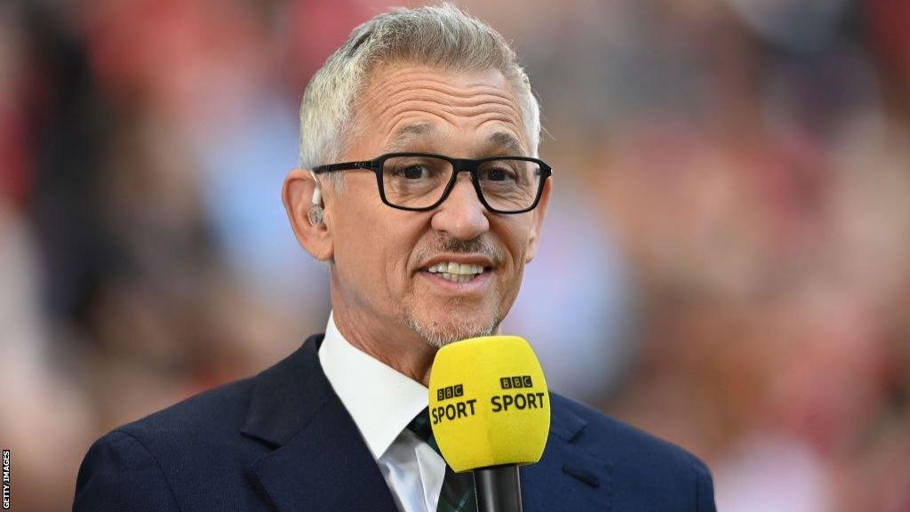 Gary Lineker holding a BBC Sport microphone