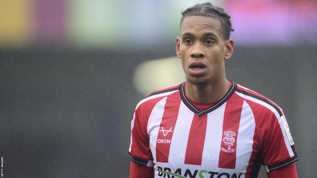 Alistair Smith in action for Lincoln City