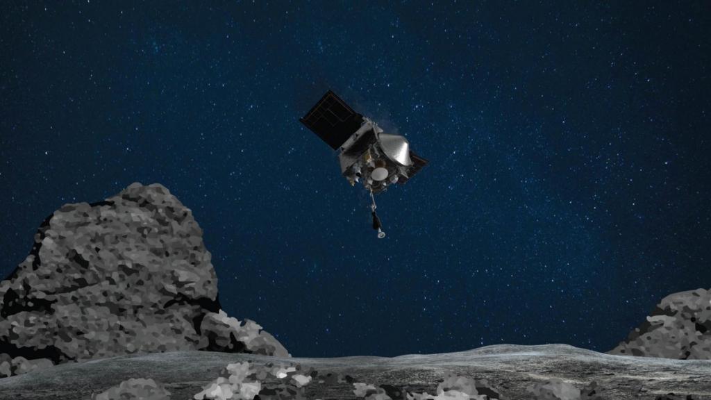 Undated handout artist impression issued by Nasa's Osiris-Rex spacecraft collecting a sample from the asteroid Bennu