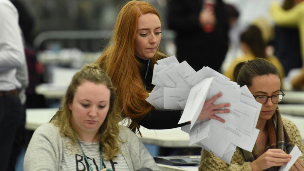 Staff begin counting ballot papers at the count centre in Uxbridge