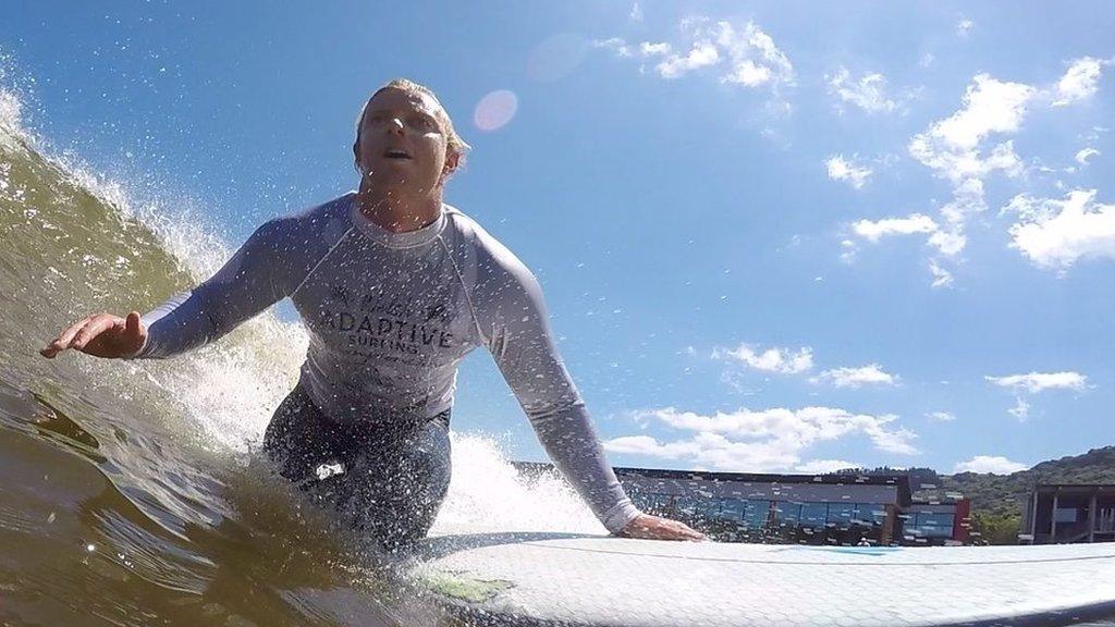 Adaptive surfer Llywelyn Williams in action at Adventure Parc Snowdonia