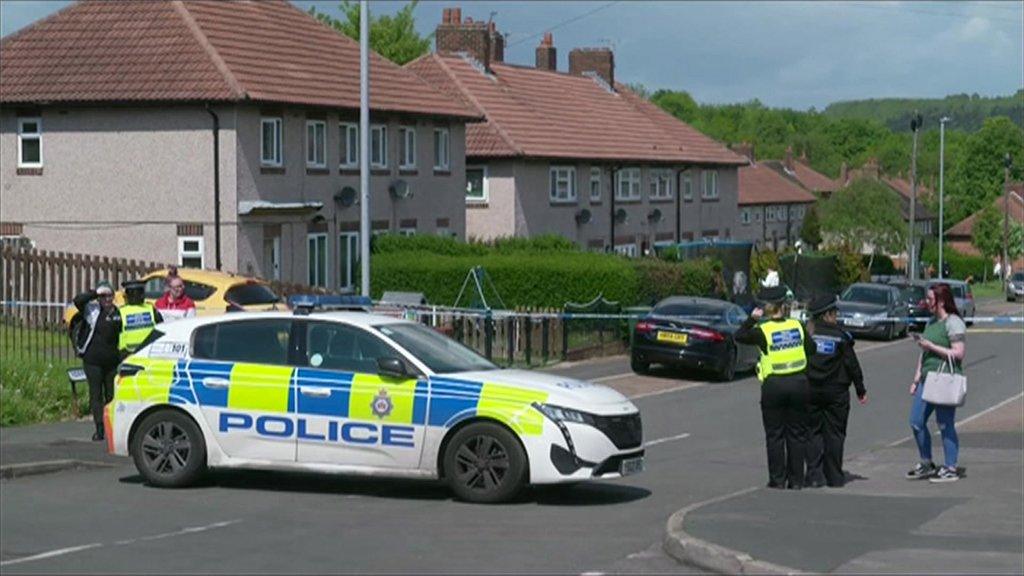 Police outside Katie Higton's home