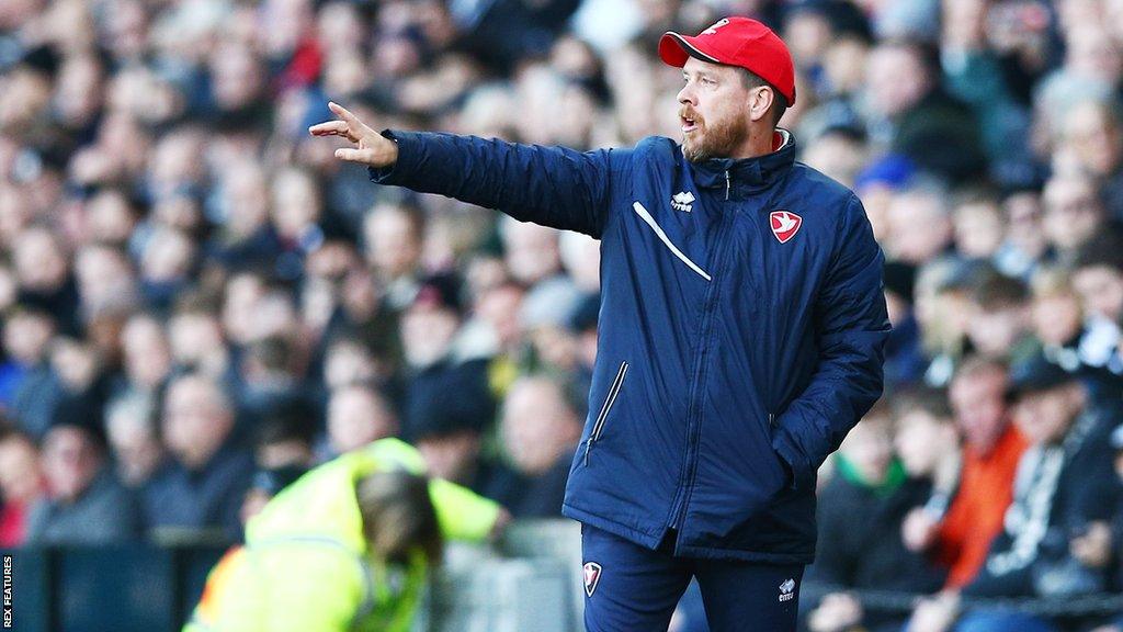 Darrell Clarke points from the sidelines during a Cheltenham game