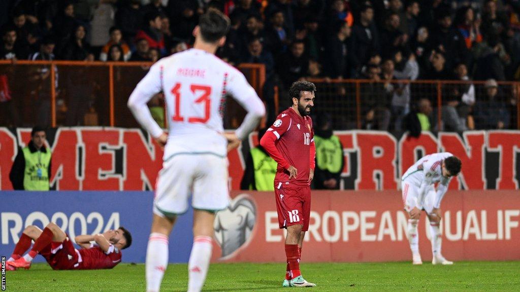 Wales player Kieffer Moore looks dejected in Armenia