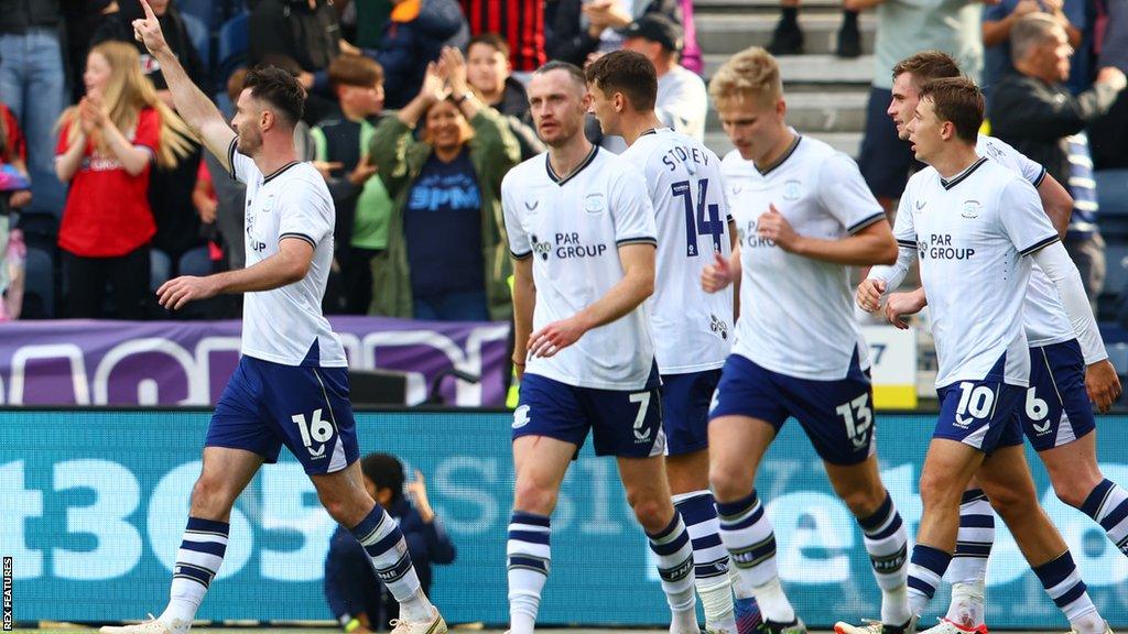 Andrew Hughes celebrates after scoring his first goal of the season to bring Preston level