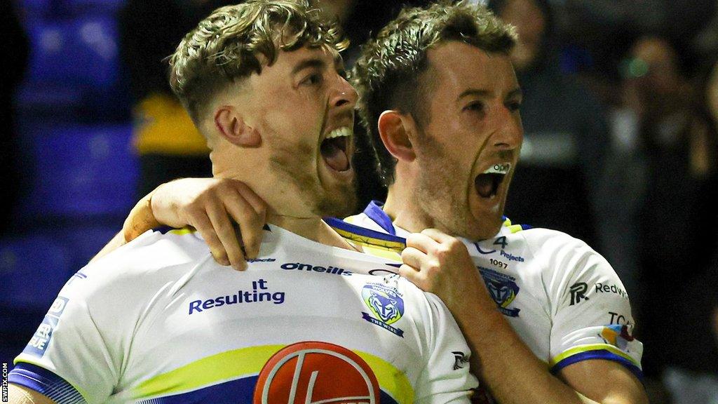 Matty Ashton celebrates with Stefan Ratchford