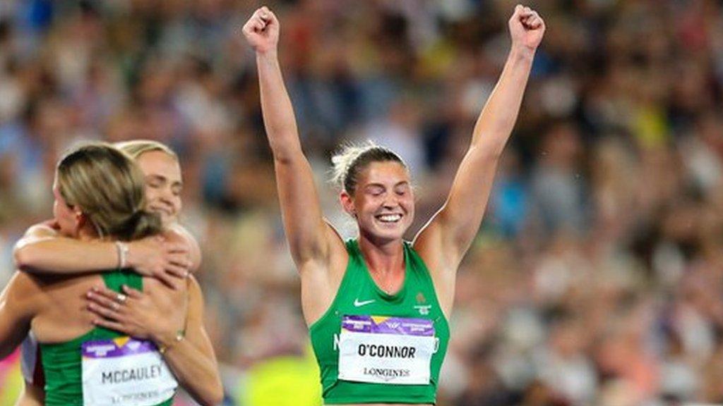 Kate O'Connor celebrates securing a silver medal at Alexander Stadium on Wednesday