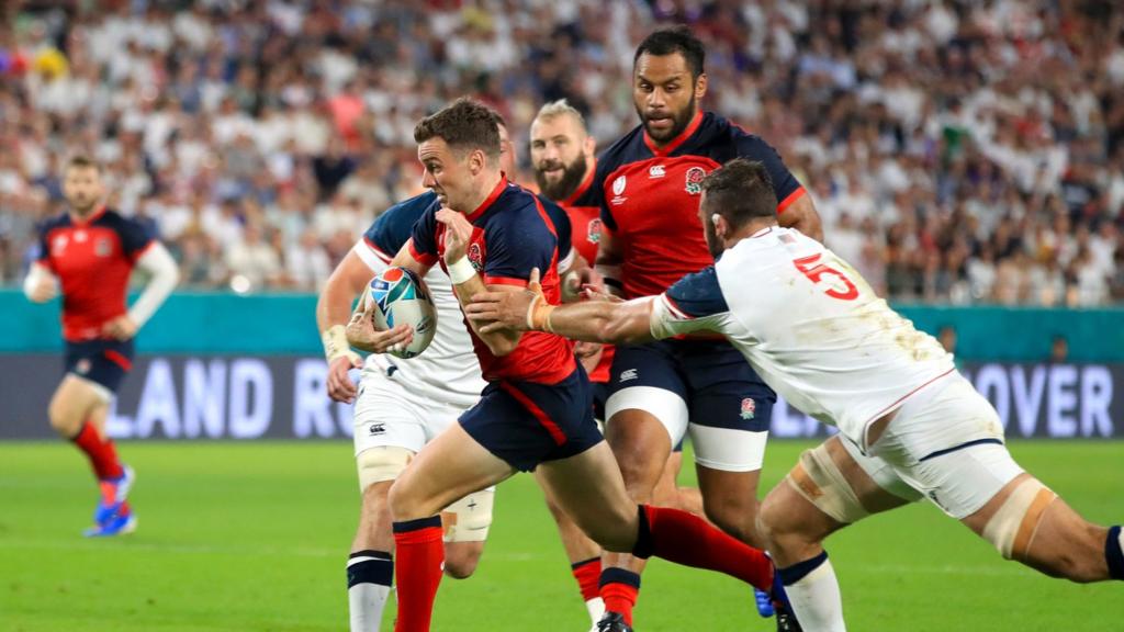 George Ford runs through to score the first try