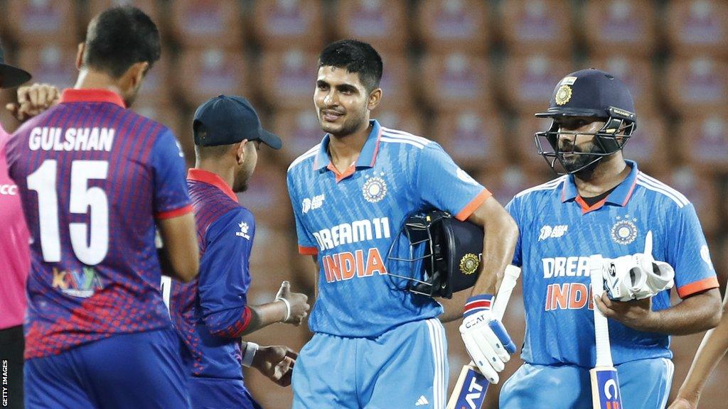 India players Shubman Gill and Rohit Sharma shake hands with Nepal players after Asia Cup victory