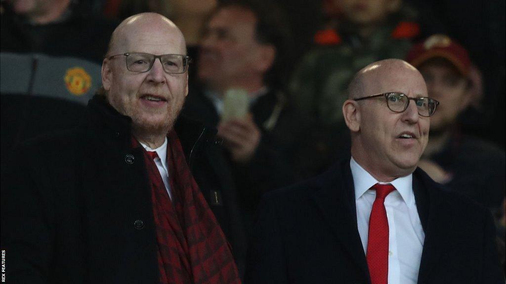 Avram (left) and Joel Glazer attend a Manchester United match