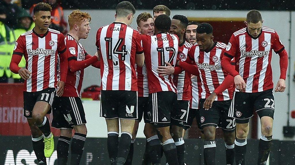 Brentford celebrate Lewis Macleod's equaliser