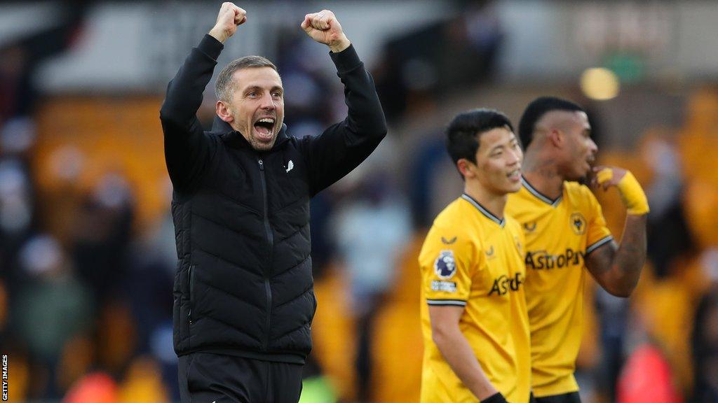 Gary O'Neil celebrating on the pitch after Wolves' win over Chelsea in December