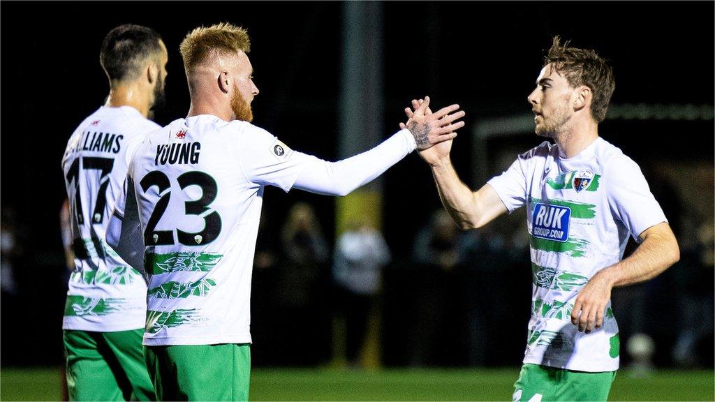 Brad Young celebrates after scoring Saints; third goal