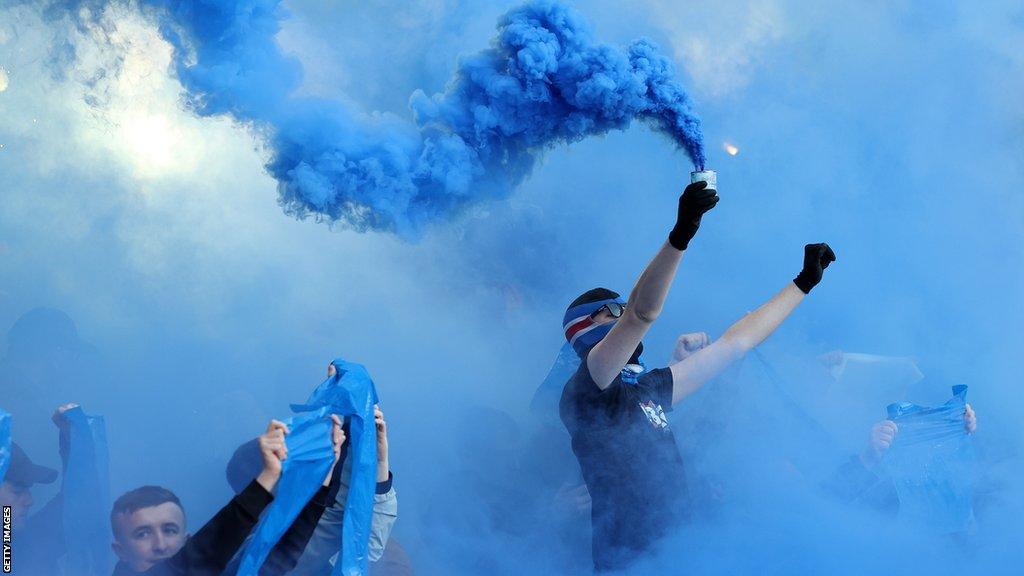 Rangers fans let off flares at a Scottish Cup match