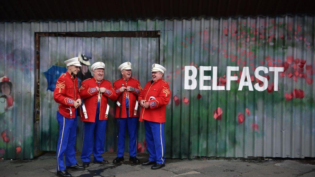 range band members put on their uniforms before setting off on the Twelfth Of July March