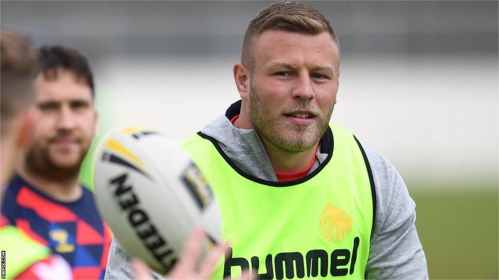 Josh Jones receives a pass during training with the Great Britain side in 2019