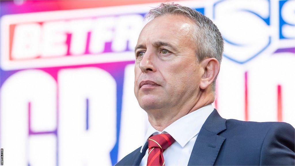 Catalans Dragons head coach Steve McNamara stands before the Grand Final