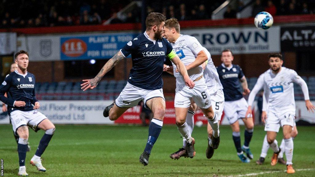 Ryan Sweeney heads Dundee in front at Dens Park