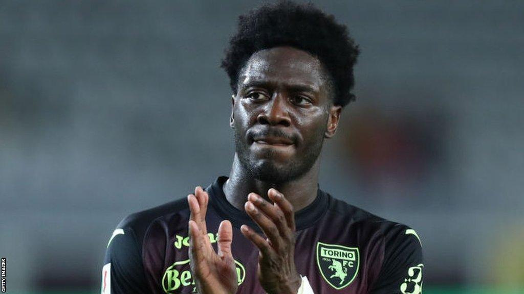 Ola Aina applauds