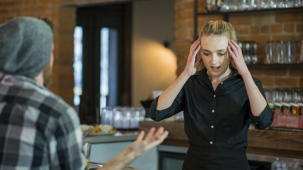 Stressed waitress