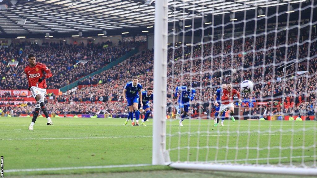 Marcus Rashford scores from the penalty spot in Manchester United's victory over Everton in the Premier League