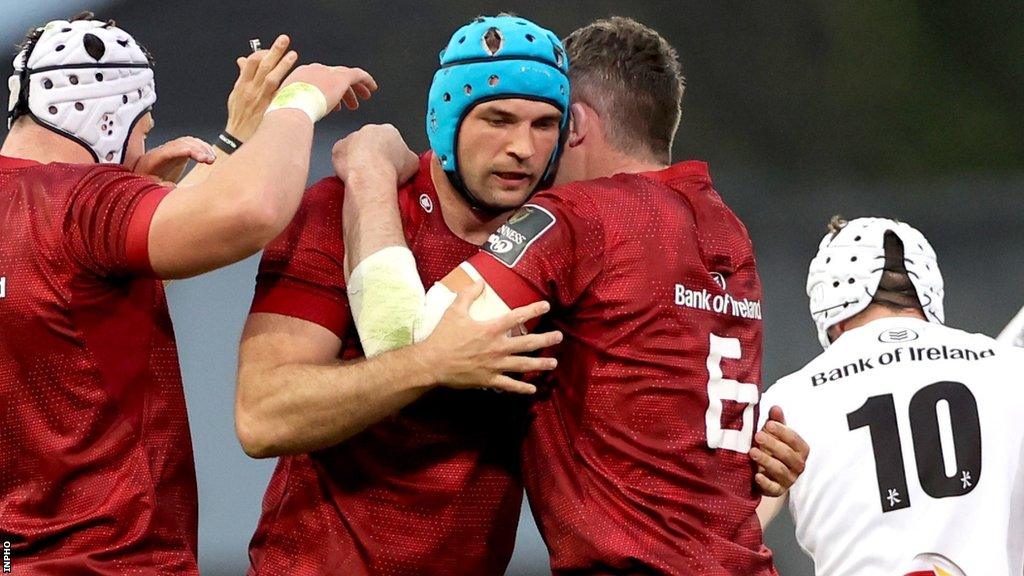 Peter O'Mahony embraces Tadhg Beirne after a turnover by the British and Irish Lion in the Rainbow Cup game against Ulster 18 months ago