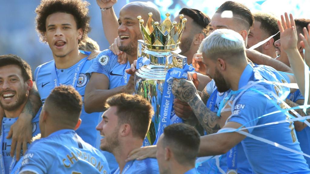 Manchester City lift the Premier League trophy