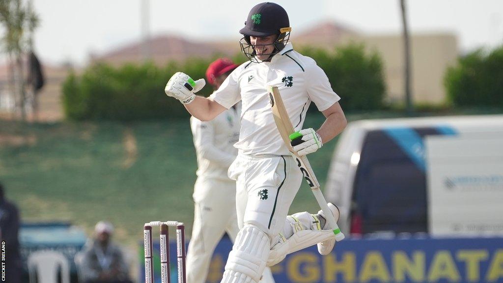 Lorcan Tucker celebrates as he runs through to seal Ireland's victory over Afghanistan at the Tolerance Oval,