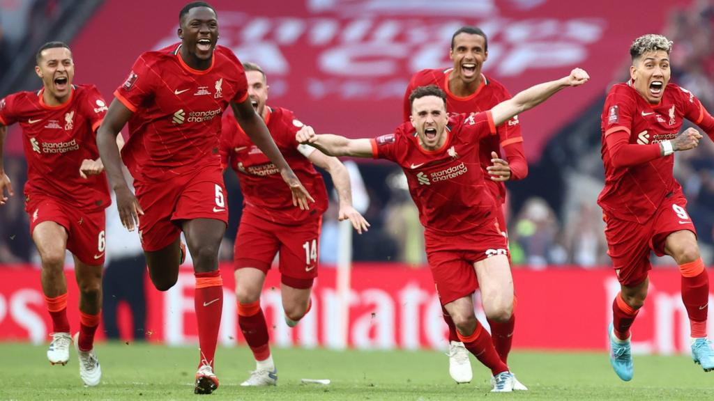 Liverpool celebrate winning the FA Cup