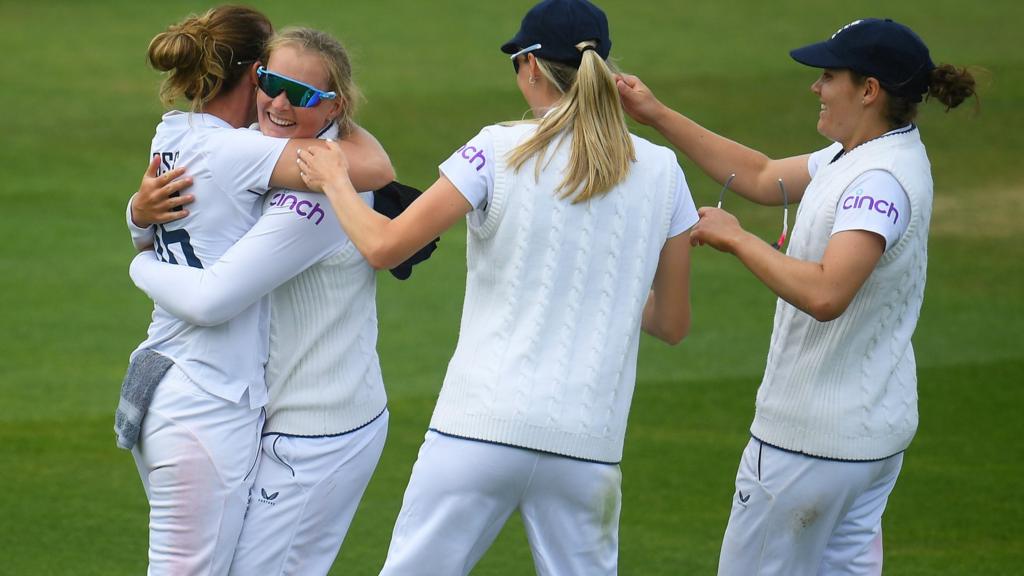 England players celebrate a wicket