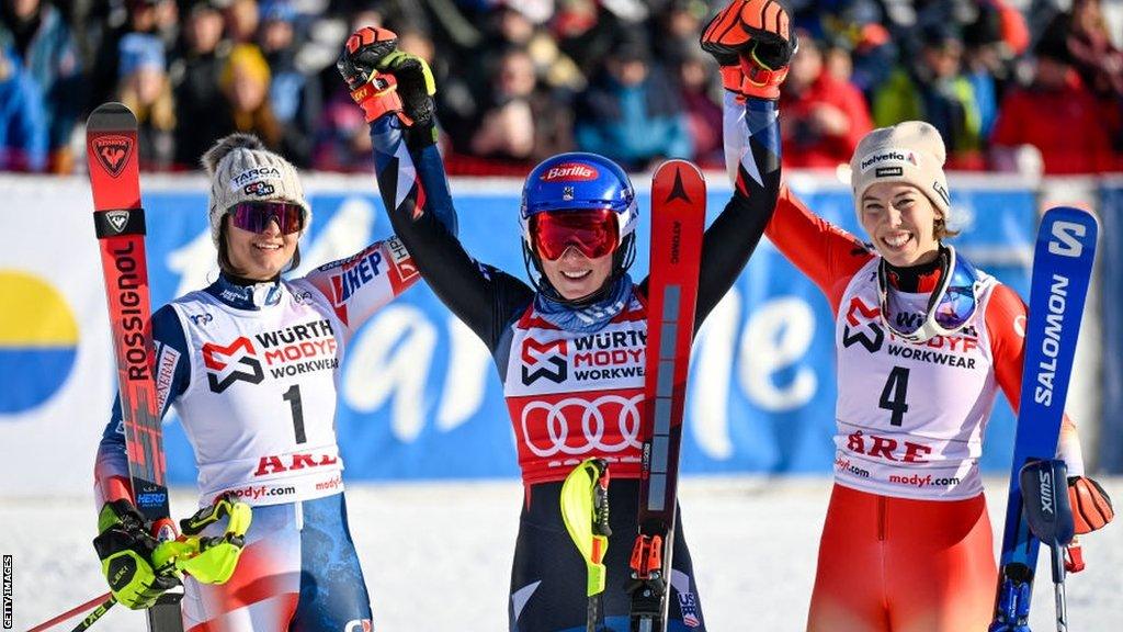 Mikaela Shiffrin on the podium in Are, Sweden with second-placed Croat Zrinka Ljutic and Switzerland's Michelle Gisin