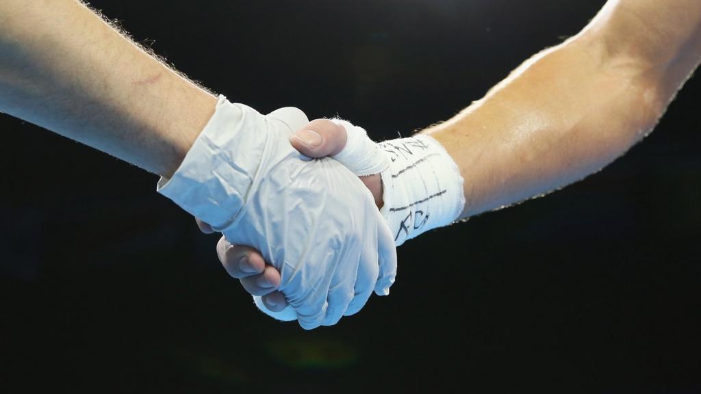 boxing handshake close up