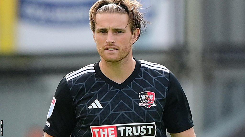 Kyle Taylor playing for Exeter City