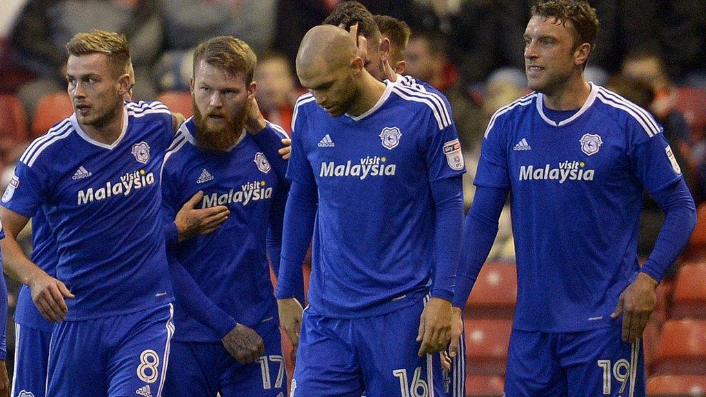 Cardiff players celebrate Aron Gunnarsson's goal