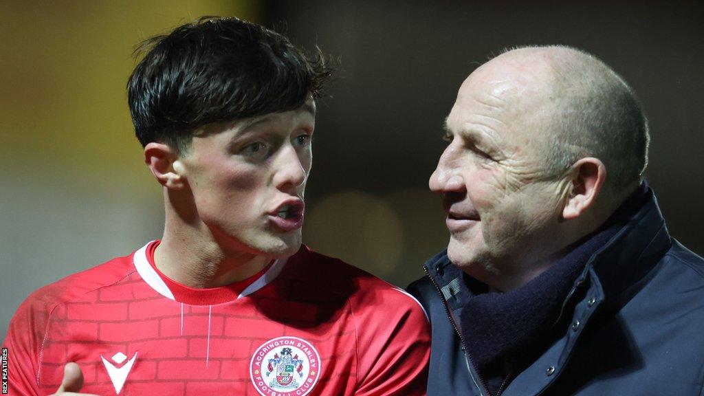 Accrington boss John Coleman talking to Josh Woods