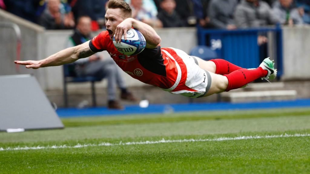 Chris Ashton celebrates scoring a try