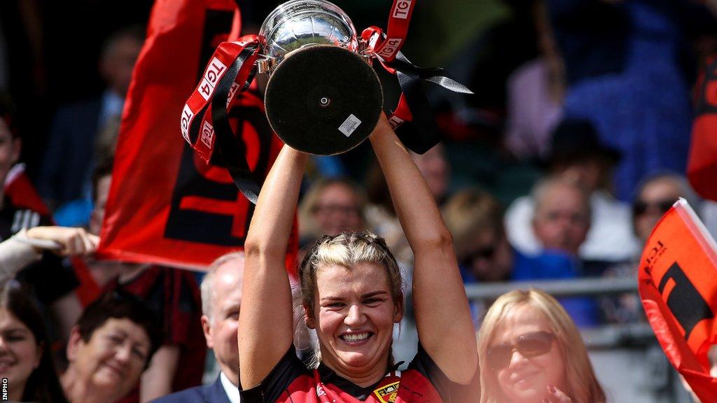 Down captain Meghan Doherty lifts the West County Hotel Cup at Croke Park